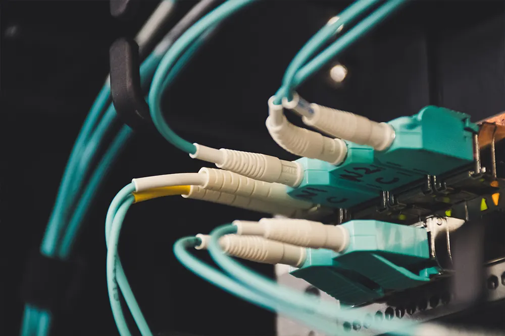 Fiber-optic patch cables in a network rack
