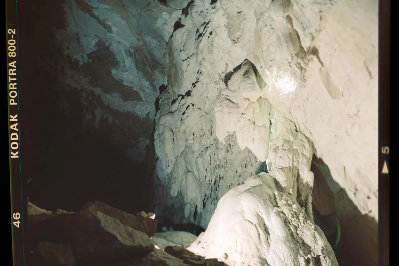Scanned film negative of a cave